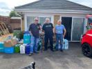 Rotarians Gary (President), John and Simon after delivery.